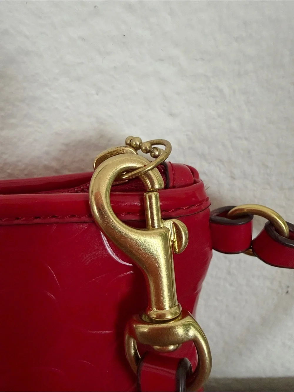 Coach glossy red
